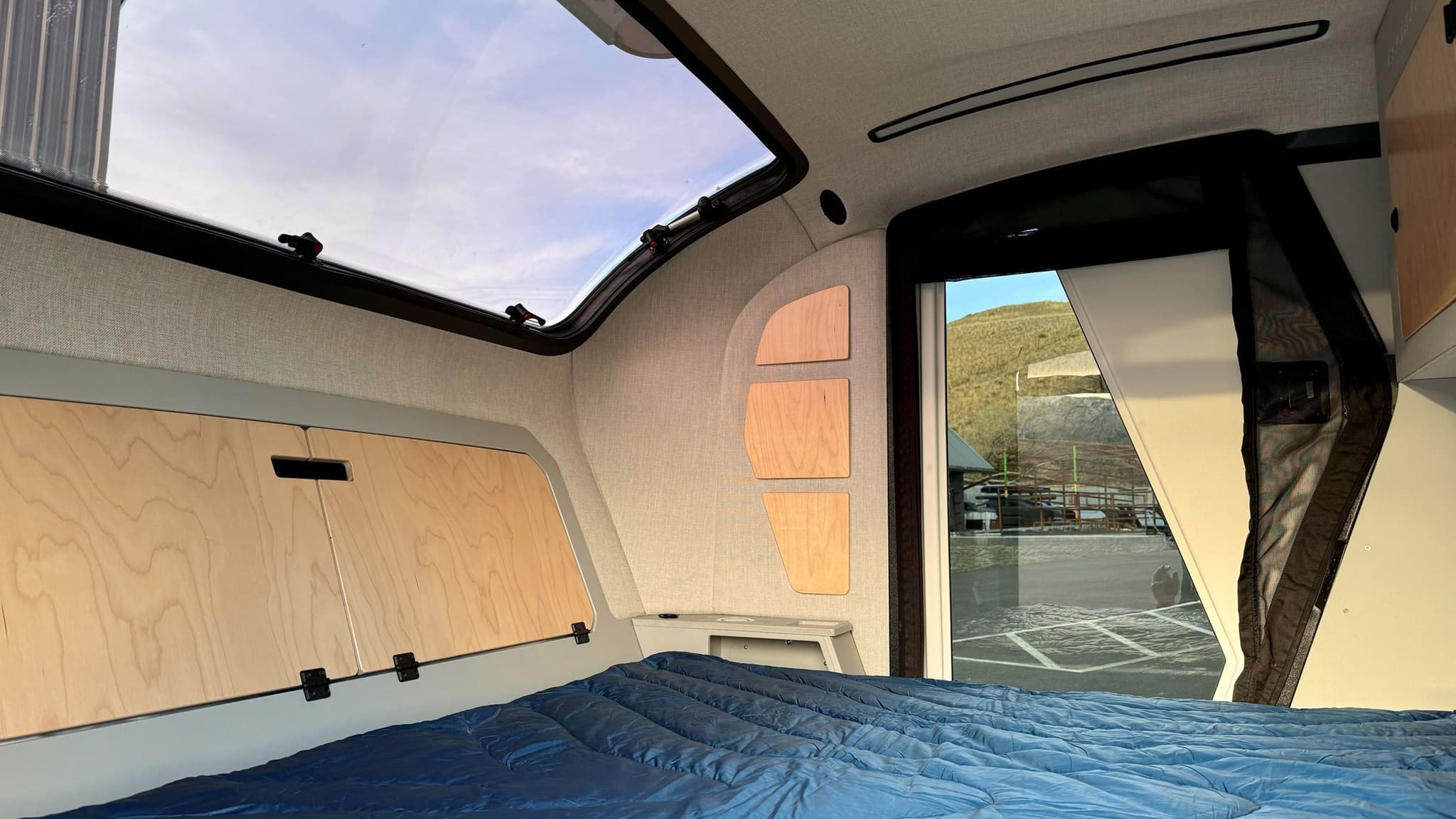 Interior of a white 2023 Escapod TOPO2, photographed at Escapod's headquarters in Coalville, UT.